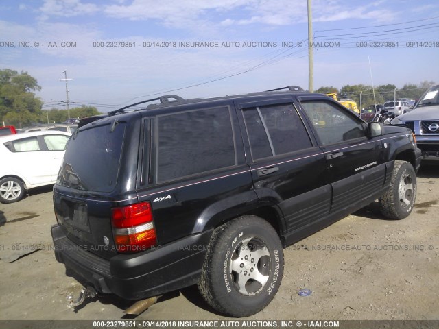 1J4GZ58SXVC607157 - 1997 JEEP GRAND CHEROKEE LAREDO/TSI BLACK photo 4