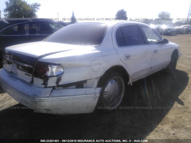 1LNLM97V6VY715960 - 1997 LINCOLN CONTINENTAL  WHITE photo 4