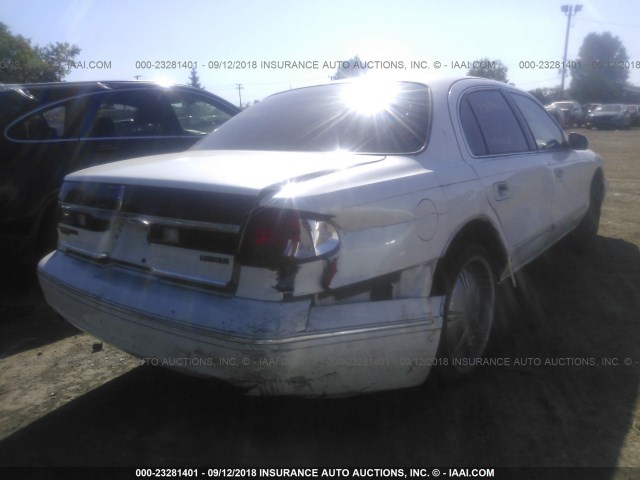 1LNLM97V6VY715960 - 1997 LINCOLN CONTINENTAL  WHITE photo 6