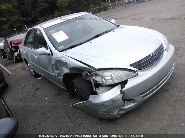 4T1BE32K43U674607 - 2003 TOYOTA CAMRY LE/XLE/SE Күміс фото 1