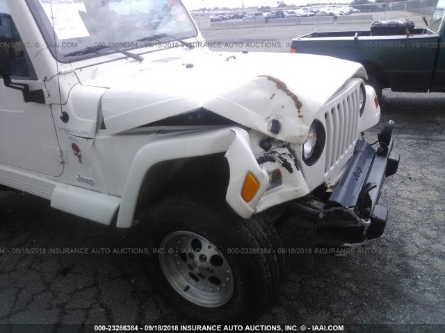 1J4FY49S7XP429016 - 1999 JEEP WRANGLER / TJ SAHARA WHITE photo 6