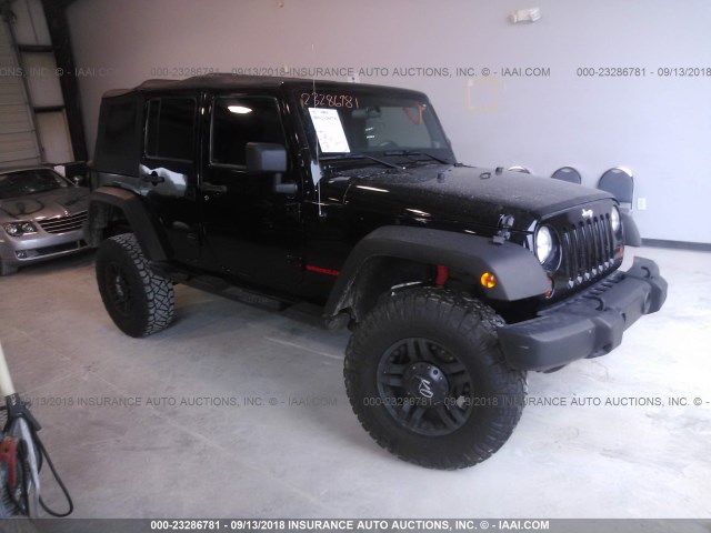 1C4BJWDG4CL234967 - 2012 JEEP WRANGLER UNLIMITE SPORT BLACK photo 1