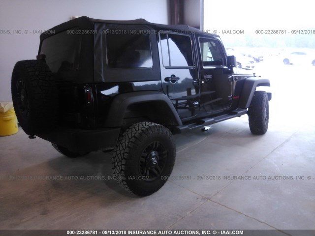 1C4BJWDG4CL234967 - 2012 JEEP WRANGLER UNLIMITE SPORT BLACK photo 4