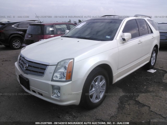 1GYDE637X40129975 - 2004 CADILLAC SRX WHITE photo 2