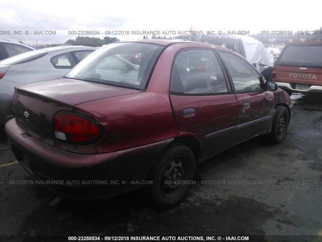 2C1MR5226X6717634 - 1999 CHEVROLET METRO LSI RED photo 4