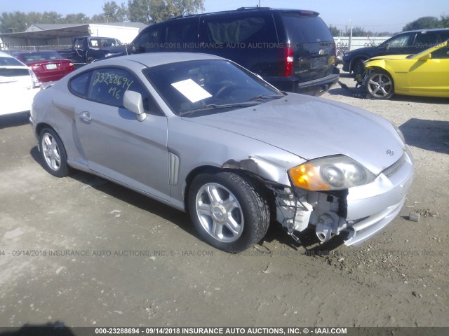 KMHHM65DX4U107511 - 2004 HYUNDAI TIBURON SILVER photo 1