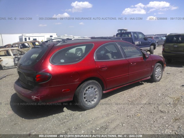 1FAFP58SXXG276444 - 1999 FORD TAURUS SE COMFORT RED photo 4