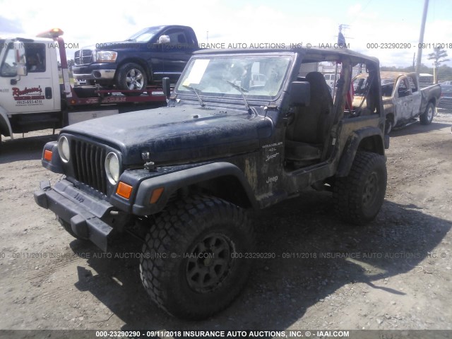 1J4FA49S4YP789060 - 2000 JEEP WRANGLER / TJ SPORT BLACK photo 2