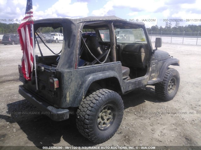 1J4FA49S4YP789060 - 2000 JEEP WRANGLER / TJ SPORT BLACK photo 4