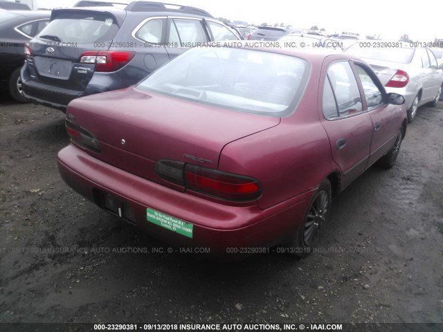 1Y1SK5360RZ009513 - 1994 GEO PRIZM LSI RED photo 4