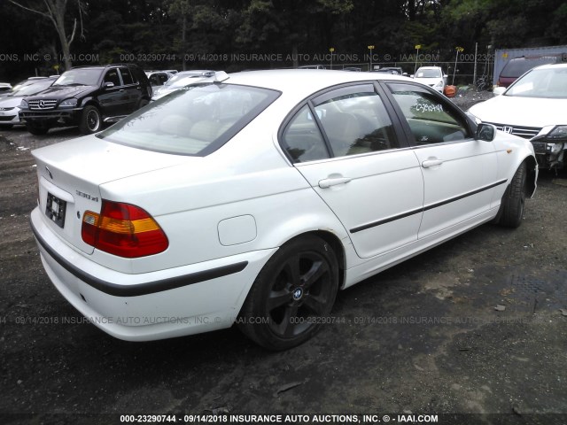 WBAEW53465PN39881 - 2005 BMW 330 XI WHITE photo 4