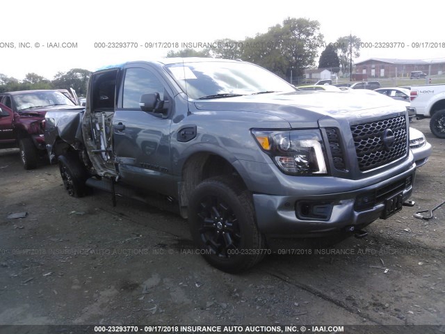 1N6BA1F49JN527543 - 2018 NISSAN TITAN XD SL/PRO-4X/PLAT RESERVE GRAY photo 1