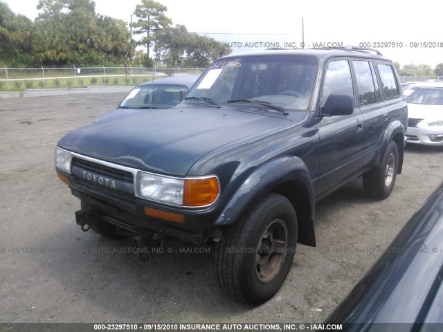 JT3DJ81W3P0032634 - 1993 TOYOTA LAND CRUISER DJ81 GREEN photo 2