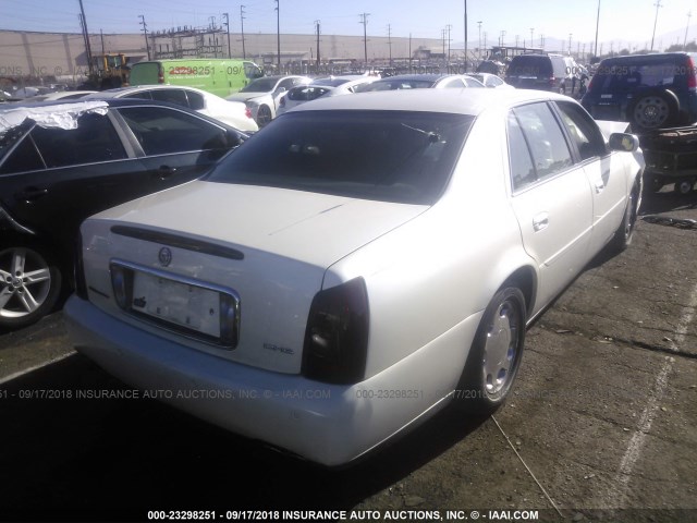 1G6KE57Y3YU307656 - 2000 CADILLAC DEVILLE DHS WHITE photo 4