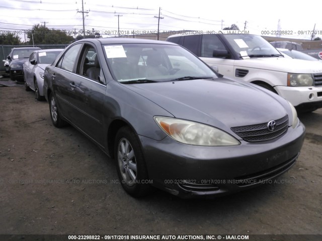 JTDBF30K920083439 - 2002 TOYOTA CAMRY LE/XLE/SE Қоңыр фото 1