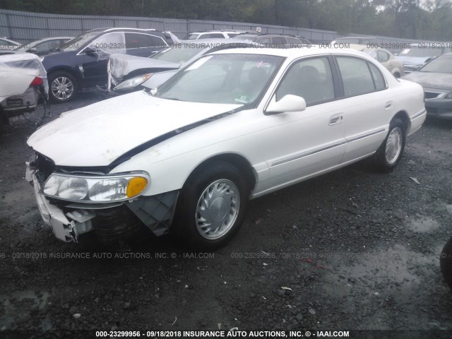 1LNHM97V21Y627083 - 2001 LINCOLN CONTINENTAL  WHITE photo 2