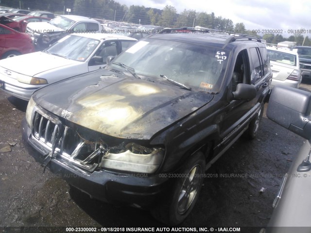 1J8GW68J74C399967 - 2004 JEEP GRAND CHEROKEE OVERLAND BLACK photo 2