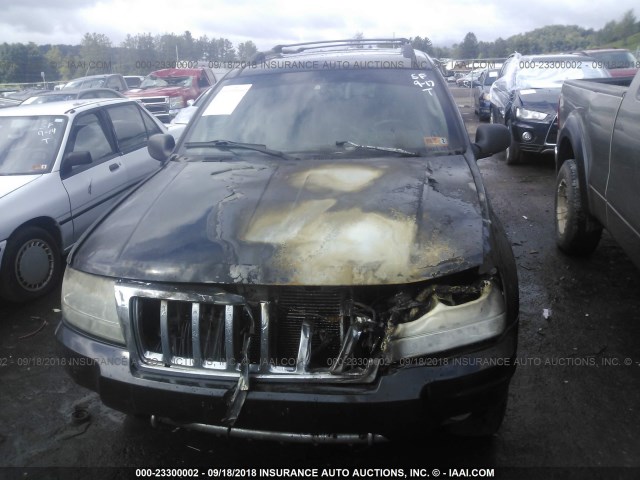 1J8GW68J74C399967 - 2004 JEEP GRAND CHEROKEE OVERLAND BLACK photo 6