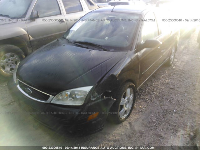 1FAHP34N47W146467 - 2007 FORD FOCUS ZX4/S/SE/SES შავი ფოტო 2