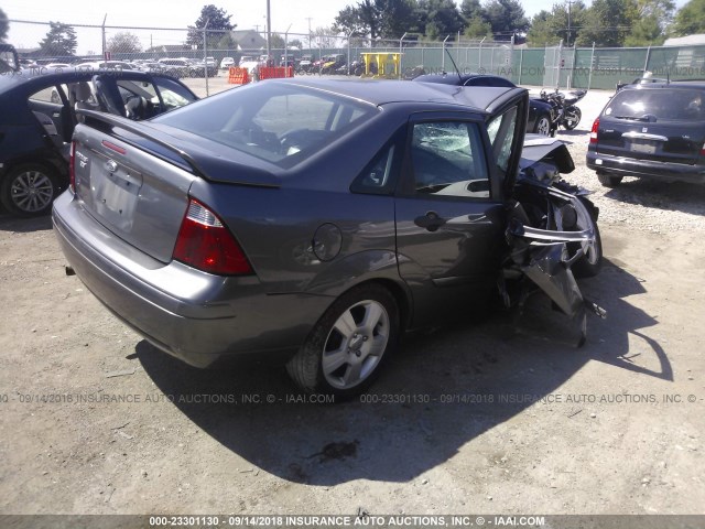 1FAFP34N37W104010 - 2007 FORD FOCUS ZX4/S/SE/SES GRAY photo 4