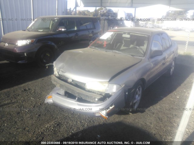 1Y1SK5268VZ444131 - 1997 GEO PRIZM LSI SILVER photo 2