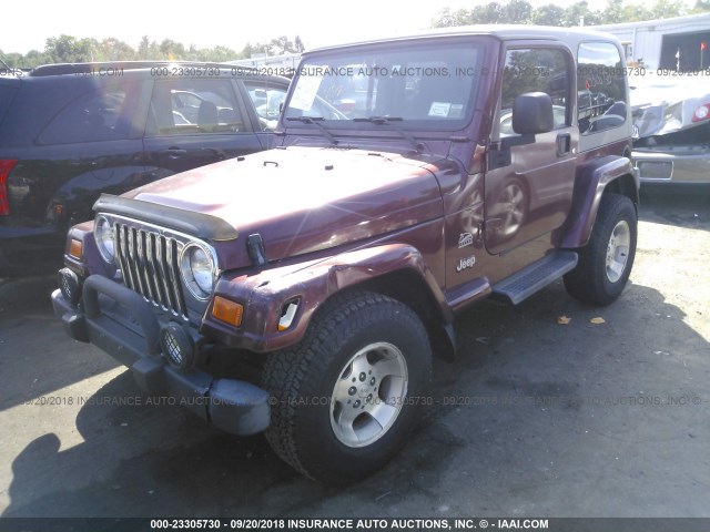 1J4FA59S13P319678 - 2003 JEEP WRANGLER / TJ SAHARA RED photo 2