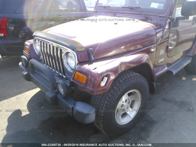 1J4FA59S13P319678 - 2003 JEEP WRANGLER / TJ SAHARA RED photo 6