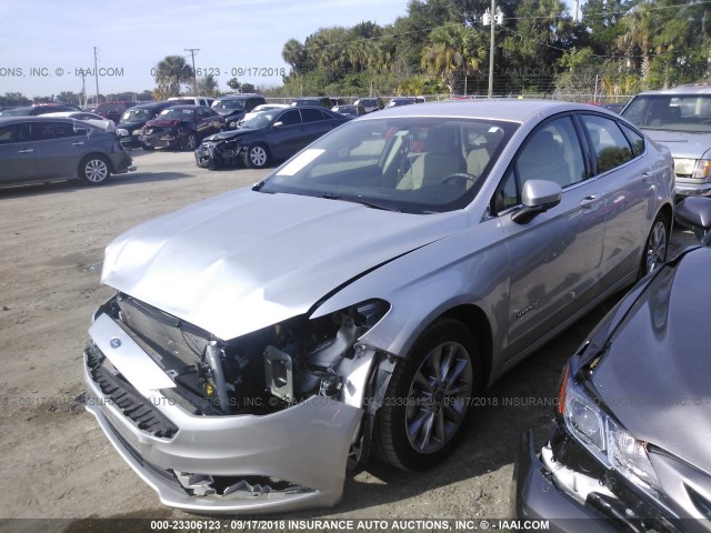 3FA6P0LU2HR304307 - 2017 FORD FUSION SE HYBRID SILVER photo 2