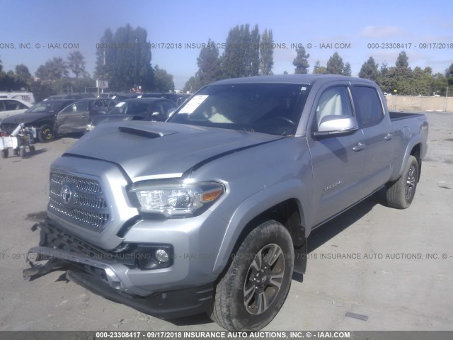 3TMBZ5DN7HM007585 - 2017 TOYOTA TACOMA DOUBLE CAB/SR5/TRD SPORT SILVER photo 2