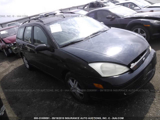 1FAHP36P4YW258914 - 2000 FORD FOCUS SE/SE COMFORT BLACK photo 1