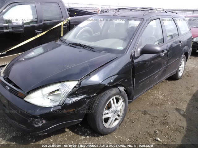 1FAHP36P4YW258914 - 2000 FORD FOCUS SE/SE COMFORT BLACK photo 6