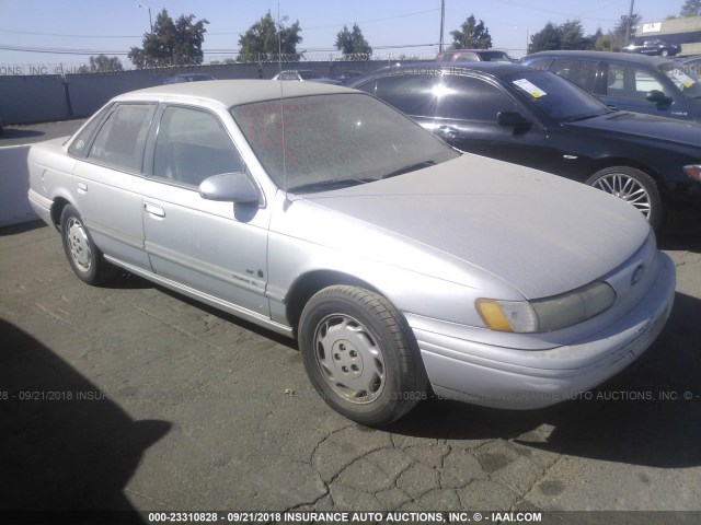 1FALP521XSG165985 - 1995 FORD TAURUS GL/SE SILVER photo 1