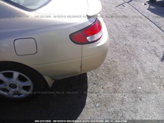 2T1CF22P1YC362812 - 2000 TOYOTA CAMRY SOLARA SE/SLE Qızıl foto 6
