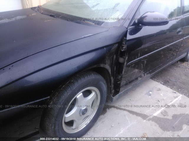 2G1WW12E939396200 - 2003 CHEVROLET MONTE CARLO LS შავი ფოტო 6