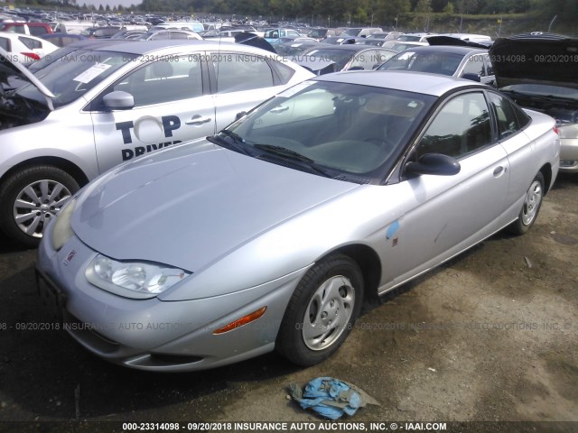 1G8ZP12842Z137432 - 2002 SATURN SC1 SILVER photo 2