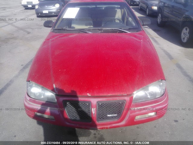 1G2NE14NXNM009635 - 1992 PONTIAC GRAND AM SE RED photo 6