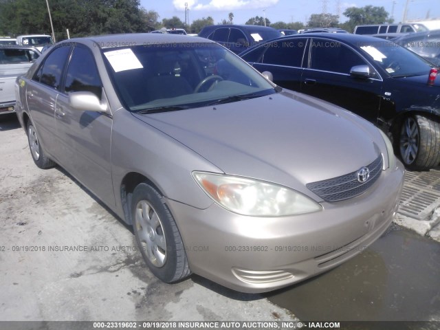 4T1BE32KX3U767180 - 2003 TOYOTA CAMRY LE/XLE/SE Бежевый фото 1