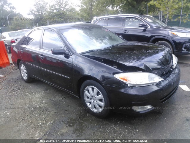 4T1BF30K23U049090 - 2003 TOYOTA CAMRY LE/XLE/SE BLACK photo 1