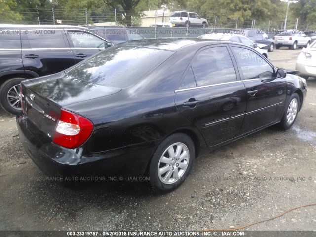4T1BF30K23U049090 - 2003 TOYOTA CAMRY LE/XLE/SE BLACK photo 4