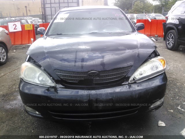 4T1BF30K23U049090 - 2003 TOYOTA CAMRY LE/XLE/SE BLACK photo 6