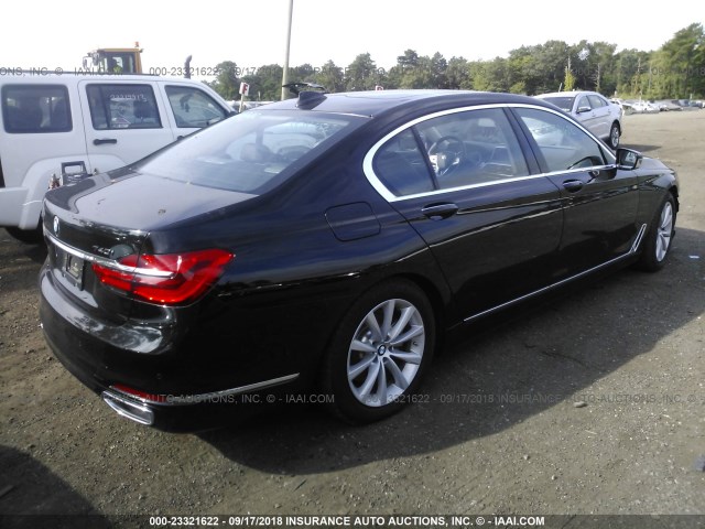 WBA7E4C56KGV28339 - 2019 BMW 740 XI შავი ფოტო 4