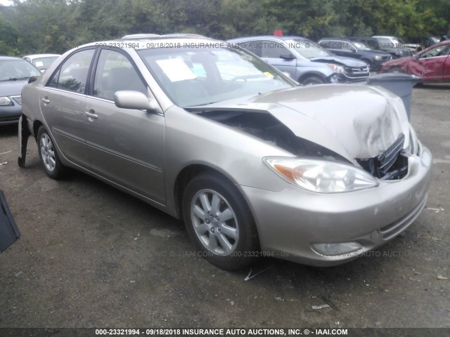 4T1BE30K13U760900 - 2003 TOYOTA CAMRY LE/XLE/SE GOLD photo 1