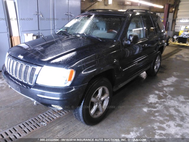 1J8GW68J42C308120 - 2002 JEEP GRAND CHEROKEE OVERLAND BLACK photo 2