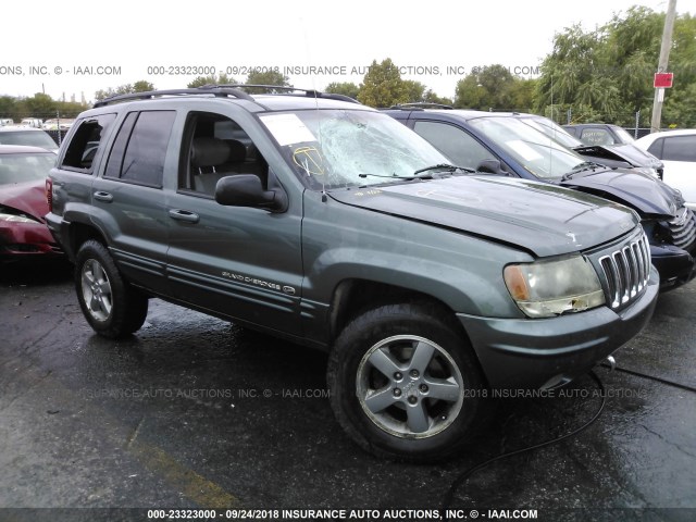 1J8GW68J12C113687 - 2002 JEEP GRAND CHEROKEE OVERLAND GRAY photo 1