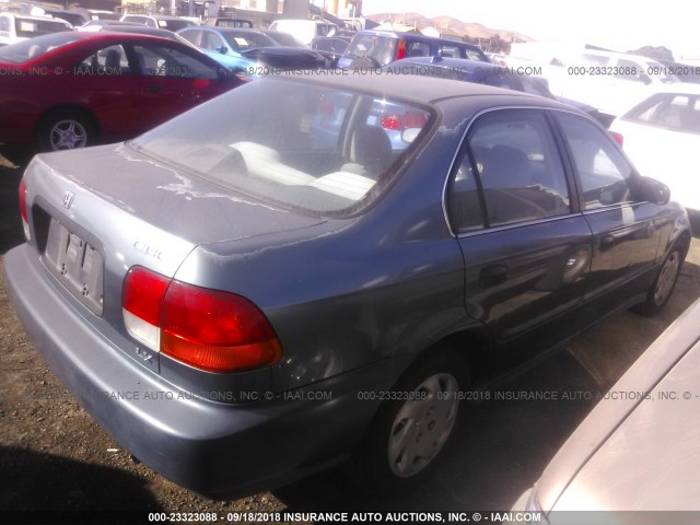 2HGEJ6677VH537348 - 1997 HONDA CIVIC LX BLUE photo 4