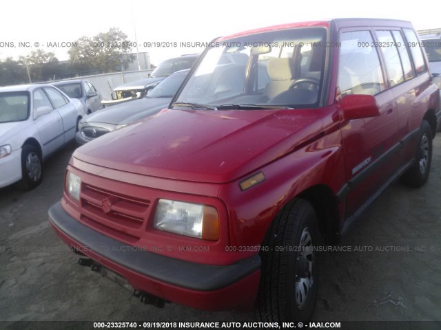 2S3TD03V5V6405182 - 1997 SUZUKI SIDEKICK JX RED photo 2