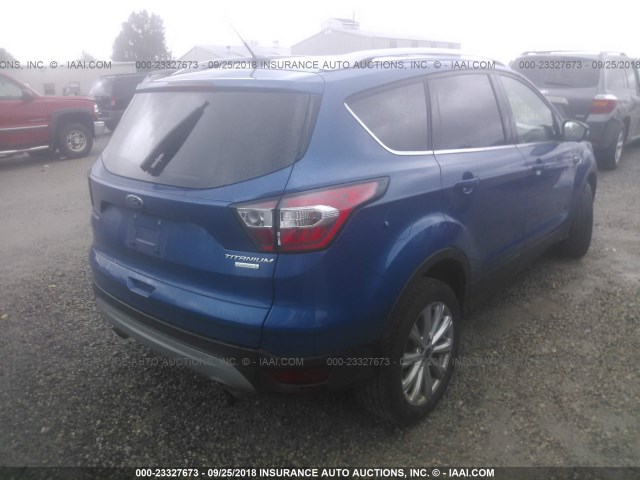 1FMCU0J90HUD82853 - 2017 FORD ESCAPE TITANIUM BLUE photo 4