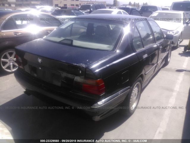 WBACB4323RFL19136 - 1994 BMW 325 I AUTOMATIC BLACK photo 4