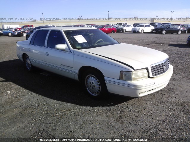 1G6KF5498XU705910 - 1999 CADILLAC DEVILLE CONCOURS CREAM photo 1