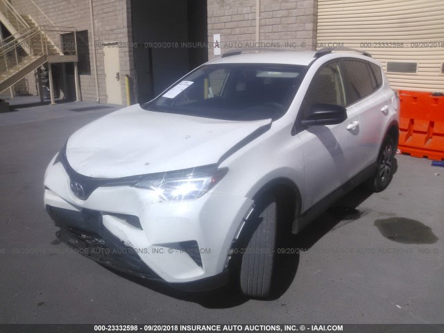 JTMZFREV5GJ074520 - 2016 TOYOTA RAV4 LE WHITE photo 2